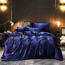 The Soleine silky satin duvet set — Indigo Blue