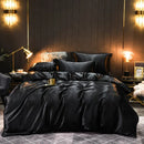 The Soleine silky satin duvet set — Onyx Black