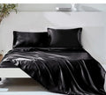 The Valois silky satin sheet set — Onyx Black