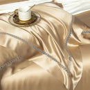 Embroidered edge and lustrous mulberry silk detail